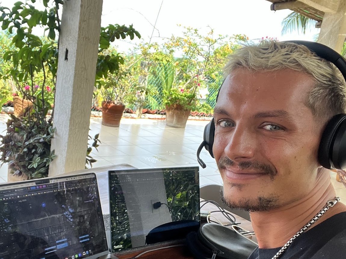 Oliver Allen at his desk, working outdoors